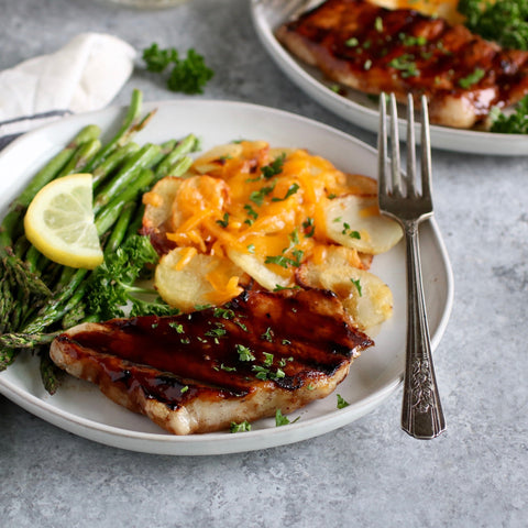 Brown Sugar Balsamic Pork Chops with Cheesy Grilled Potatoes