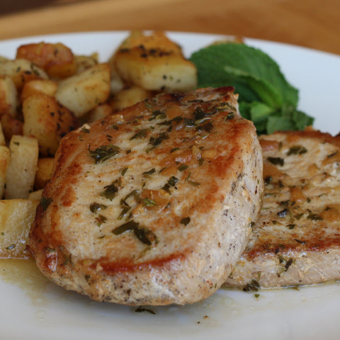 Pan-Seared Pork Chops with Herb Butter Sauce and Garlic Home Fries